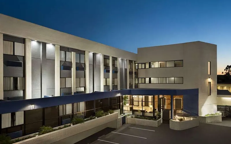 Baymont by Wyndham hotel exterior at dusk