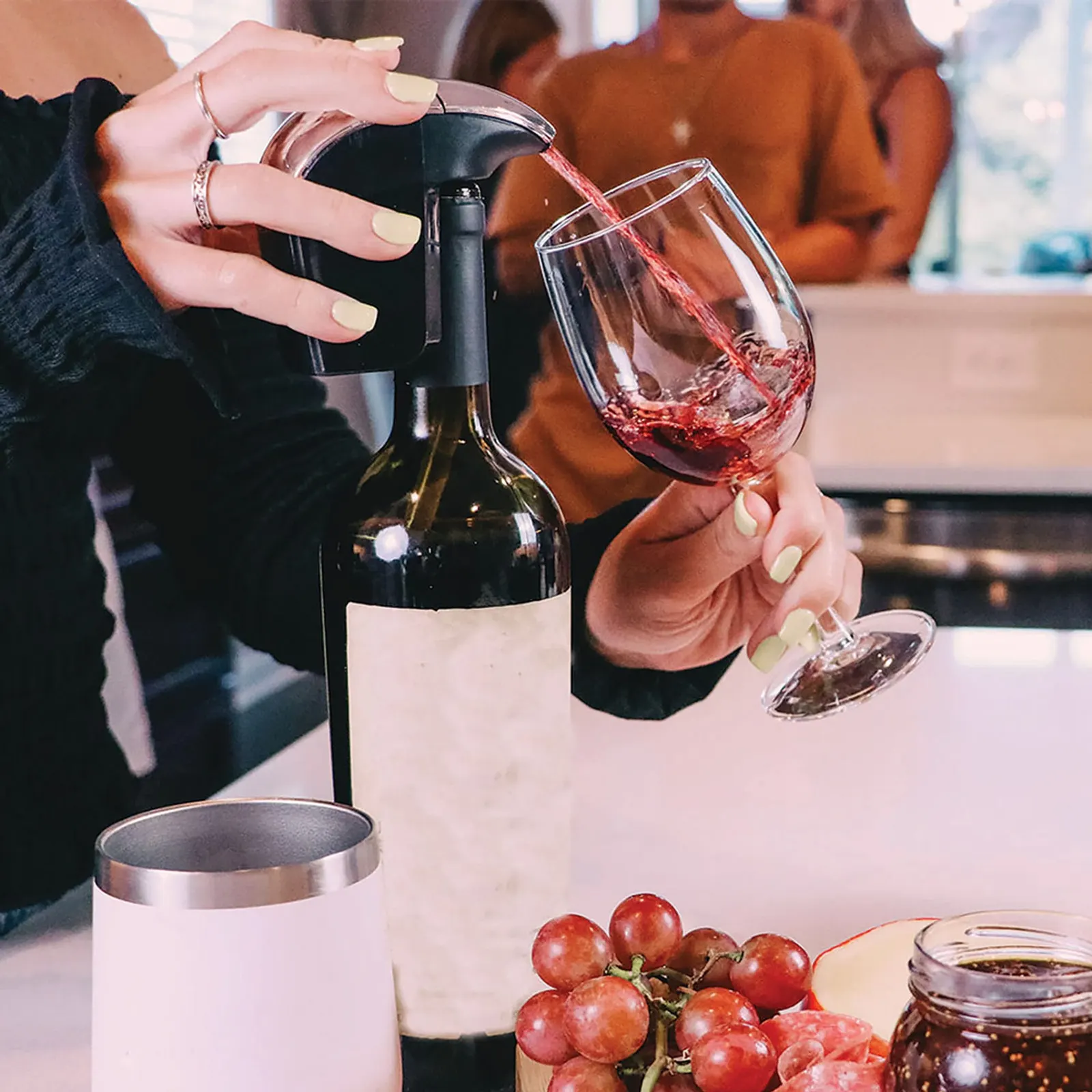 AirVi automatic wine dispenser pouring red wine into a glass